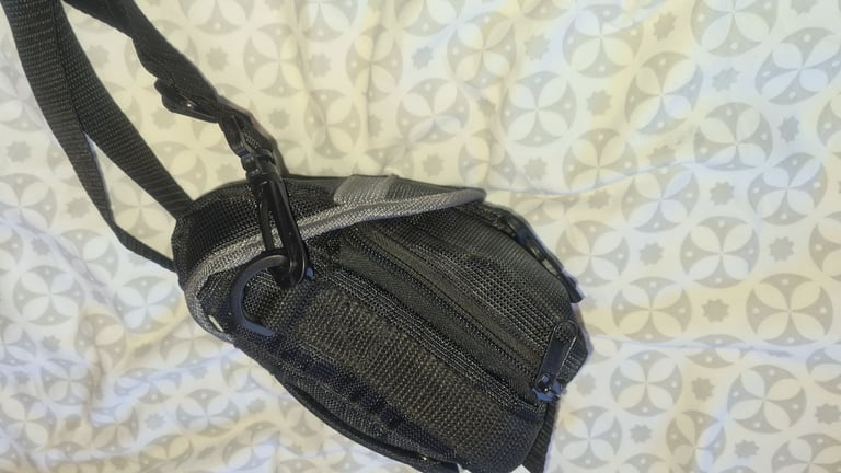 Camera bag/ case with shoulder strap. Multiple compartments. Excellent quality and condition.