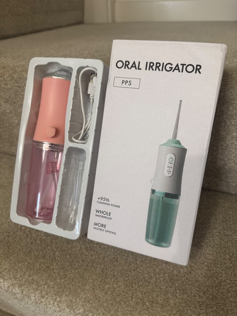 Oral irrigator