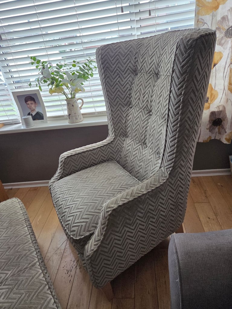 Armchair with maching footstool.  Come with 2 matching cushions 