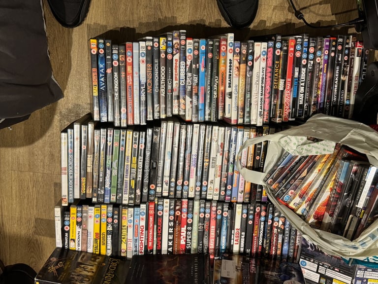 200 various titles all good films for adults and a bag of gooduns for the kids