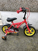 Kids fireman bike 12.5 inch wheels with stabilisers 