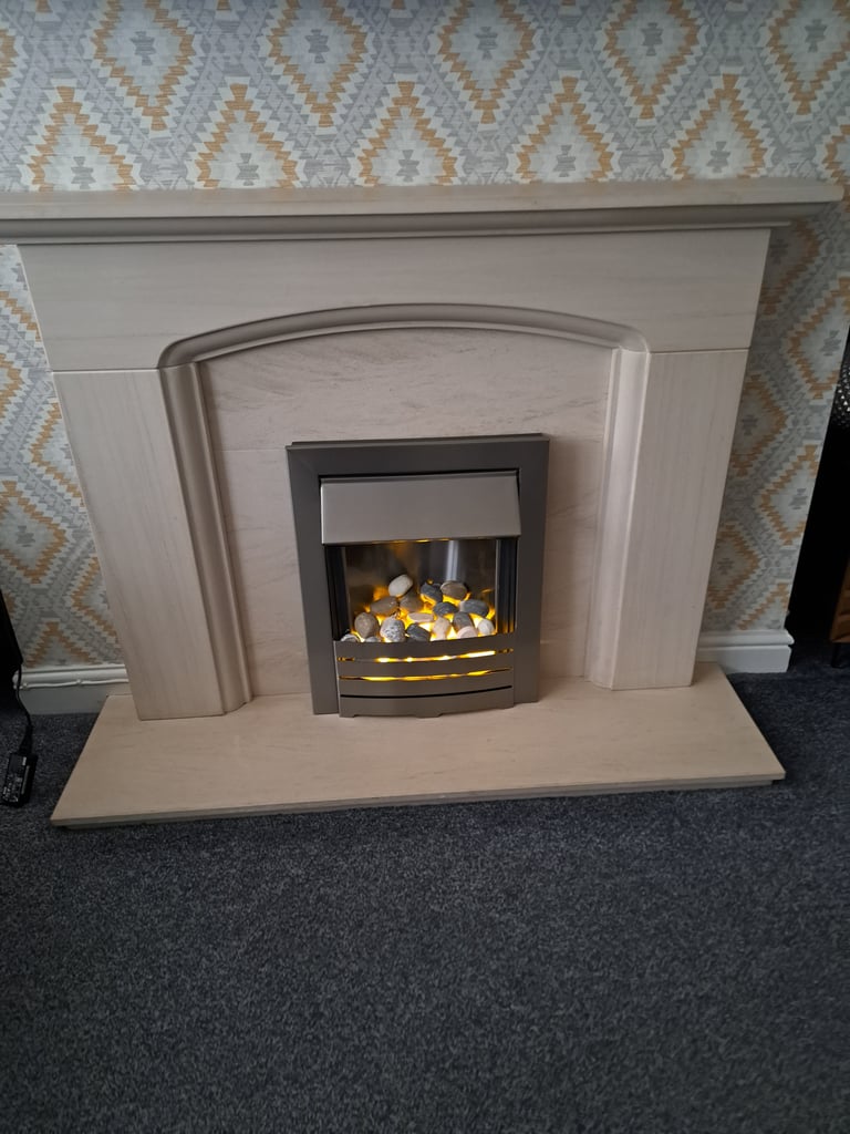 italian stone fireplace and fire