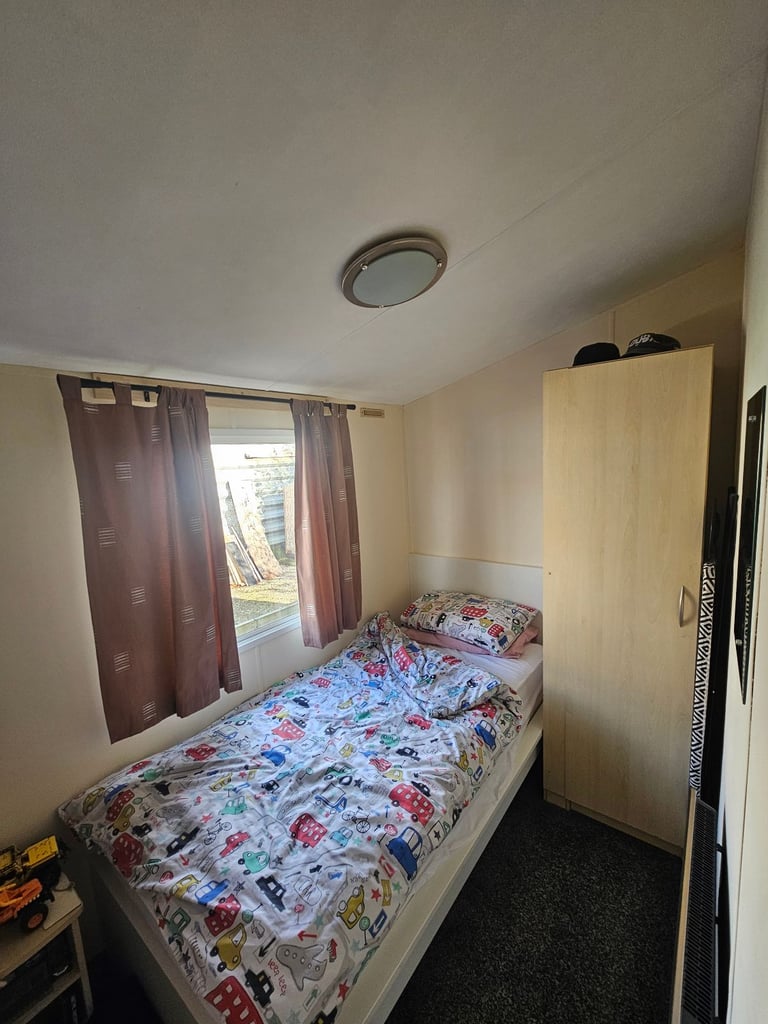 Static caravan with timber structure