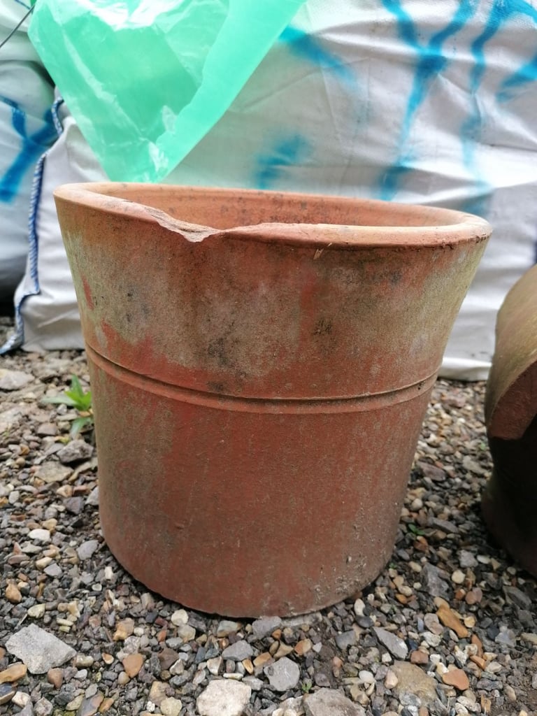 Terracotta chimney pots and top hat