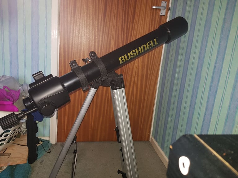 Bushnell telescope with tripod and accessories 