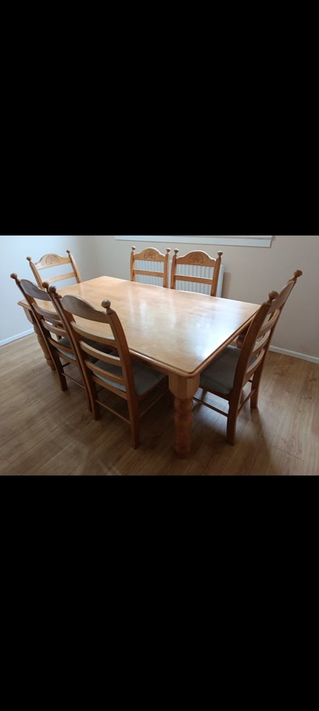 image for Wooden dining room table and 6 chairs