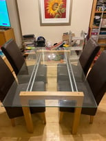 Glass dining table and 4 chairs