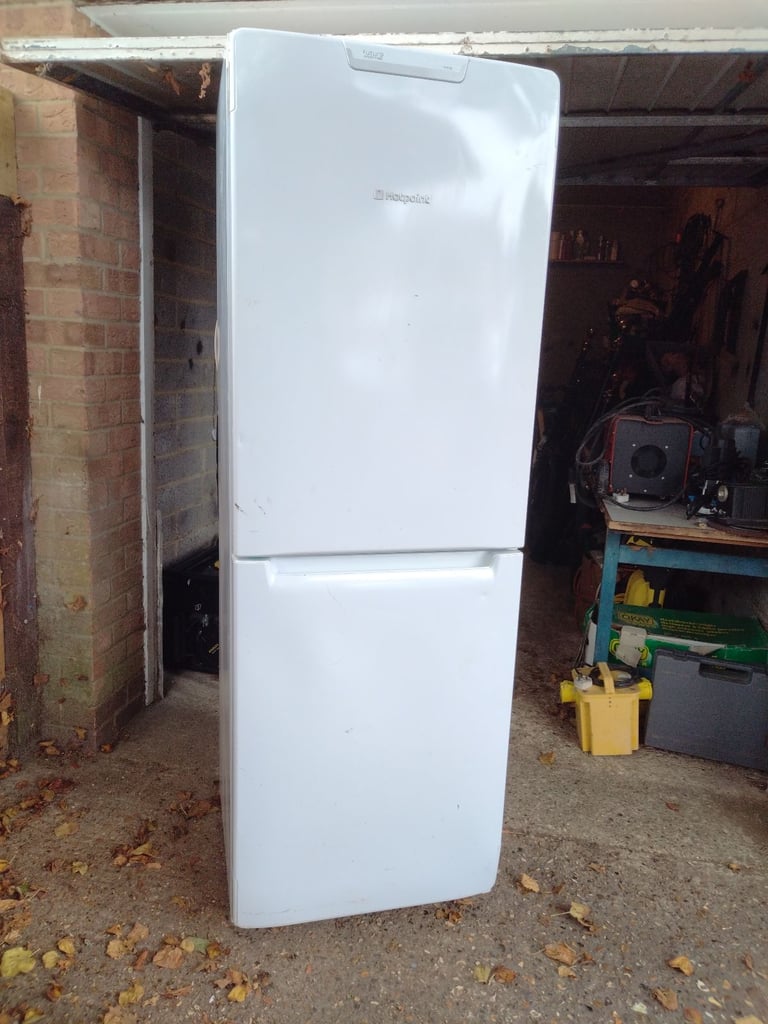 Hotpoint Fridge freezer 5ft x 9 inch high has couple of marks but all working can deliver local 
