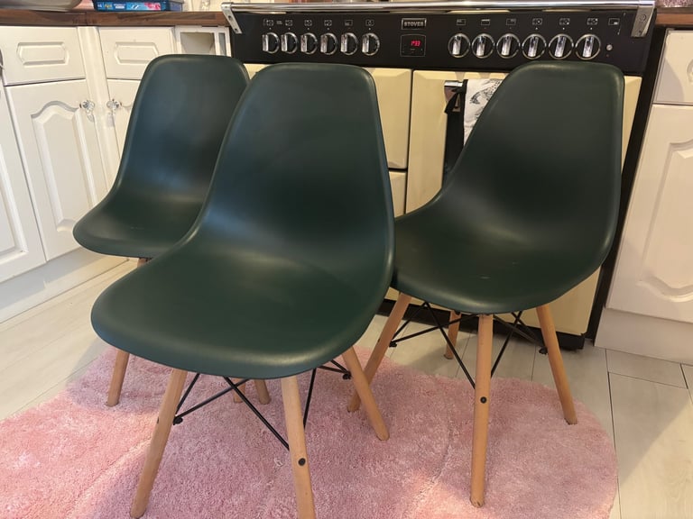 Three green chairs 