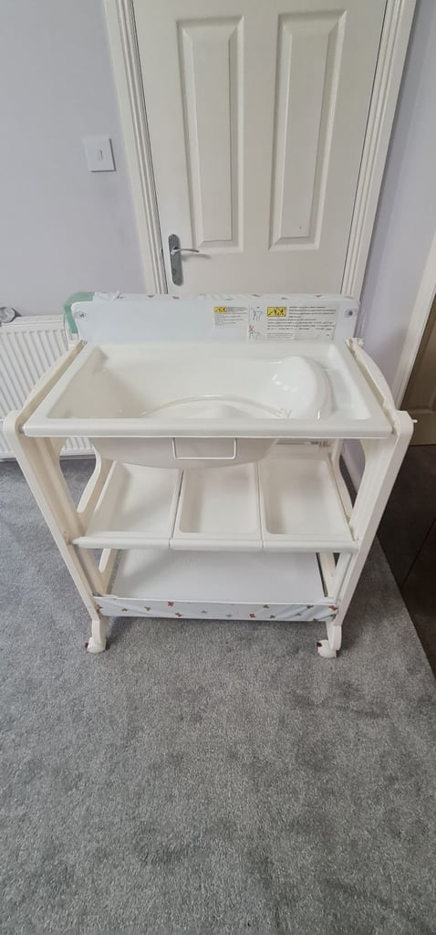 Baby changing and bathing station