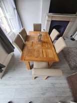 Extending dining table beech with chairs 