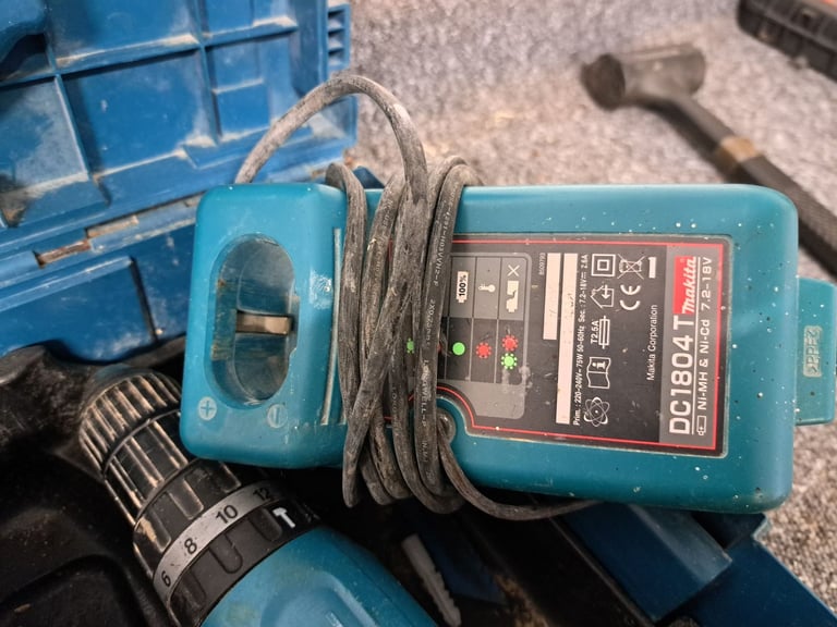 Two makita drills plus charger 