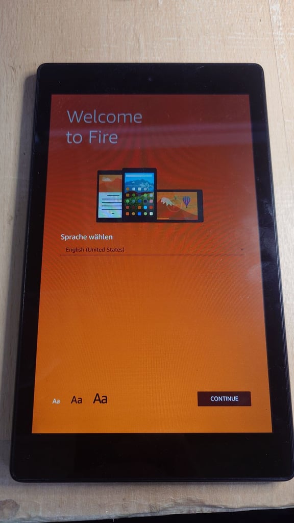 AMAZON FIRE TABLET WITH CHARGER (READ AD)