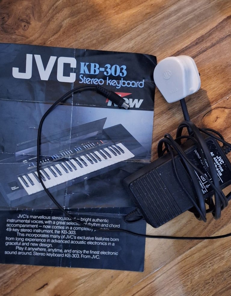 JVC electric keyboard with stand and bag