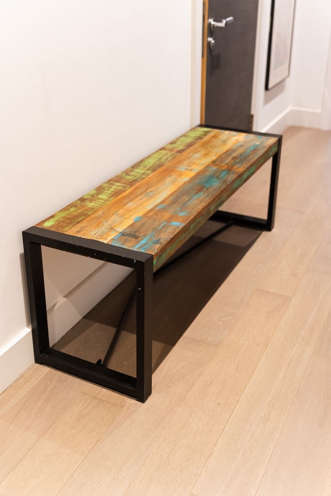 Wooden bench with a metal frame