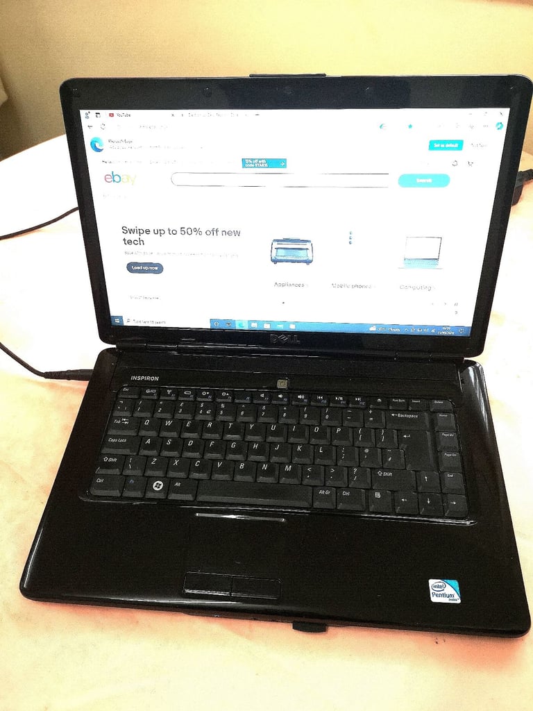 Dell Inspiron Laptop on Windows 10 with pink colour lid. . Pink colour. 