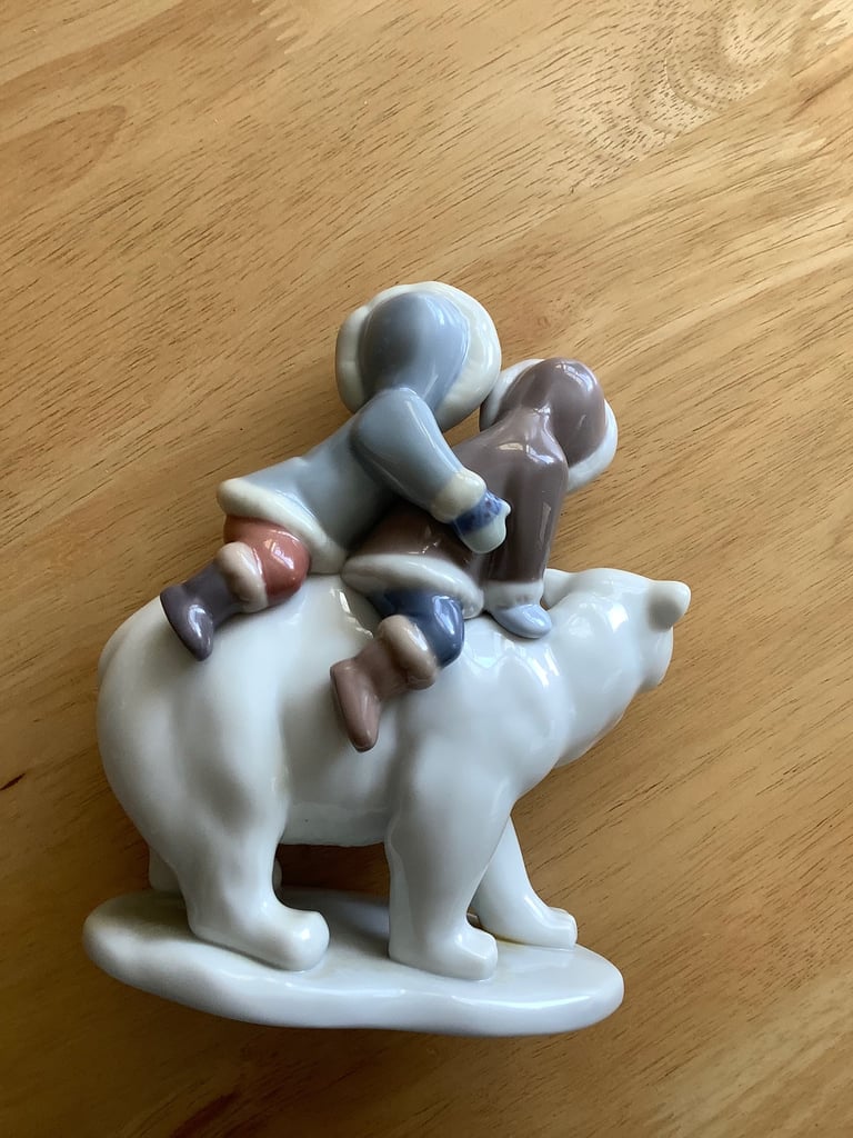 Lladro Eskimo children riders on polar bear