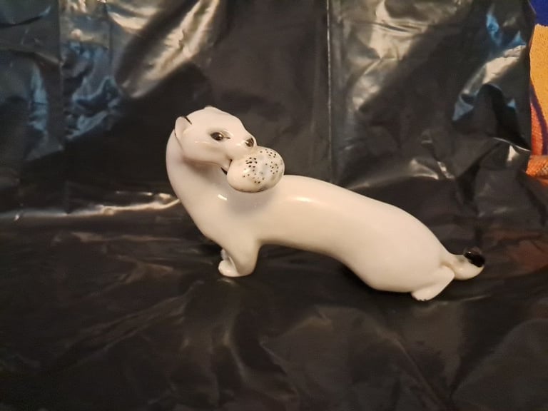 Vintage mongoose/weasel ornament