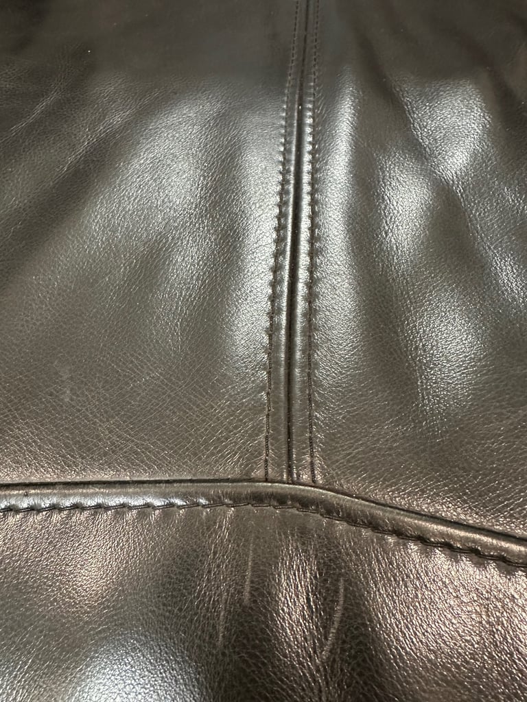 BLACK LEATHER SOFAS + FOOTSTOOL