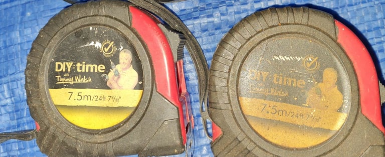 Vehicle wheel alignment brackets adjust toe in toe out and two tape measures