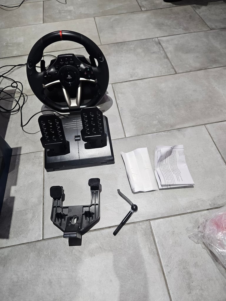 PlayStation 4 500gb with hori apex wheel and 23games