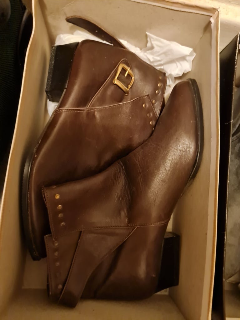 image for Size 7. 17 pairs of boots and 5 pair of sandals. 