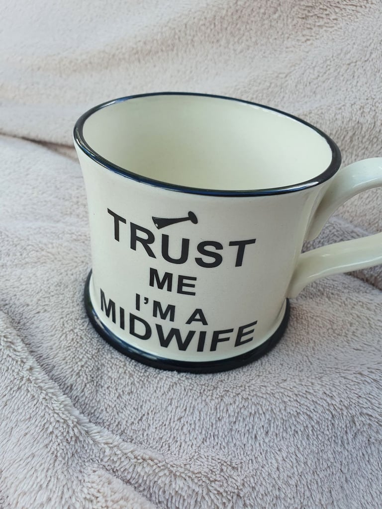 Mug printed 'Trust Me I'm a Midwife'