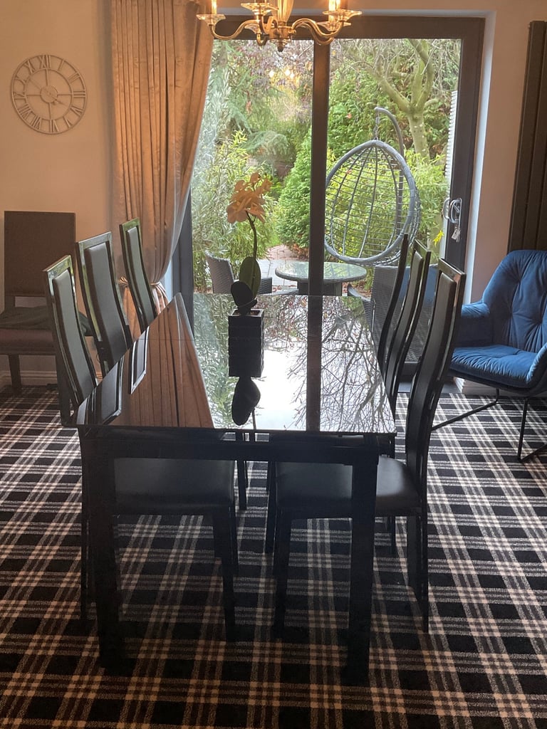 image for Harvey’s Glass table topped, extendable table with six chairs