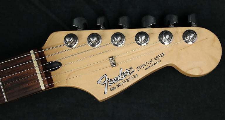 Mexican Fat Strat, Guitar bag, Guitar strap, Guitar stand, Guitar Tuner. 