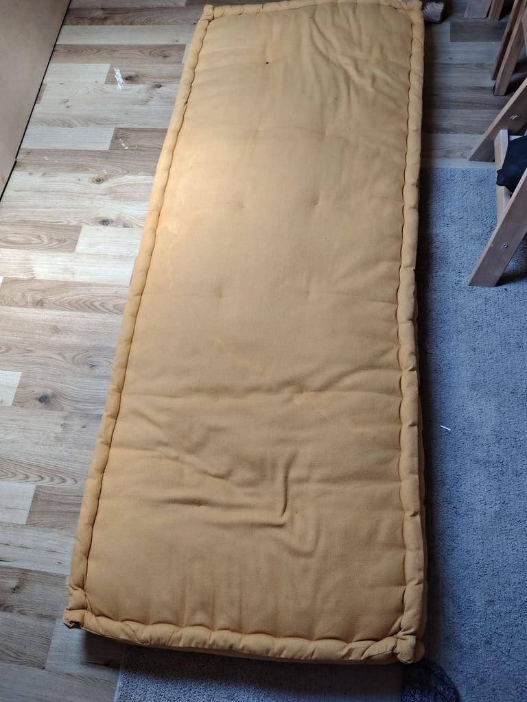 yellow futon cushion