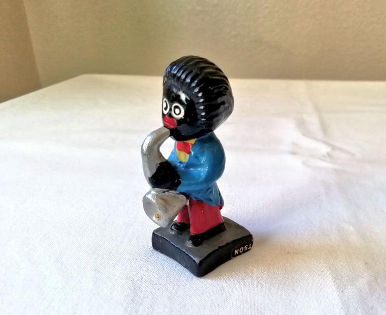 image for Vintage Robertson hand-painted pottery figurine – Saxophonist