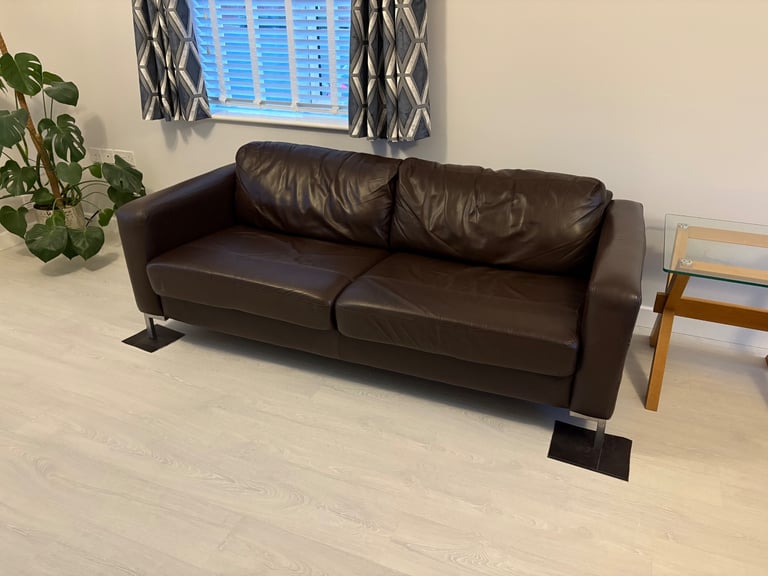2 x brown leather sofas