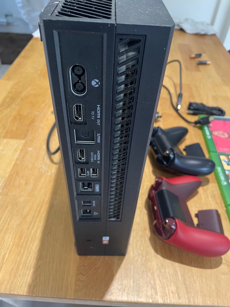 Xbox One with 2 rechargeable controllers + 3 games