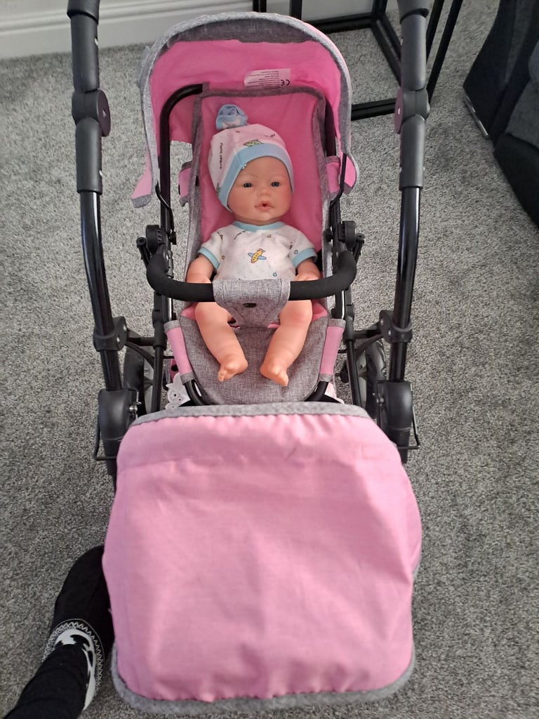 Childrens twin buggies with twin dolls 