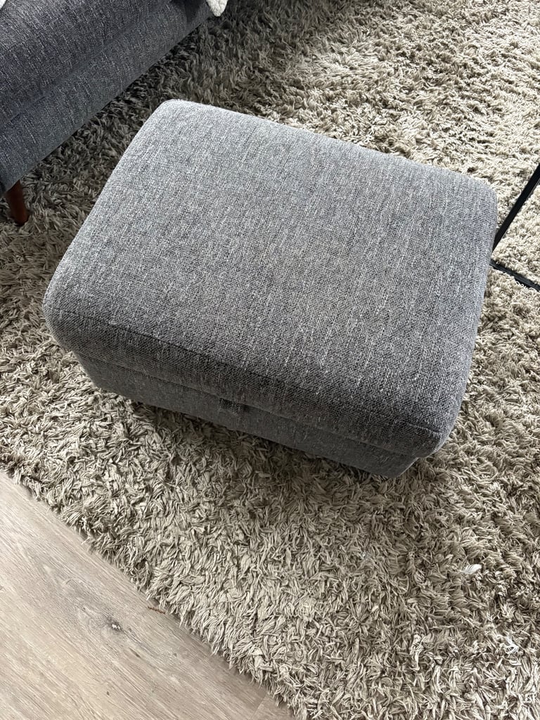 2 Four seater charcoal sofas and 2 foot stalls (DFS French connection) 