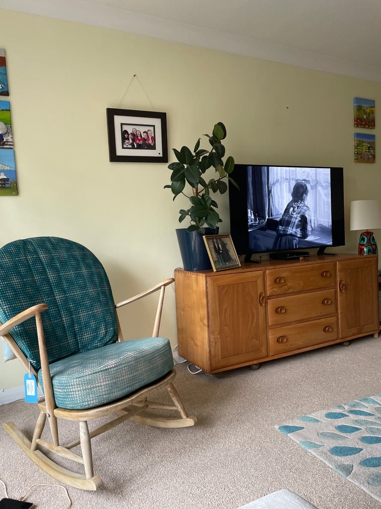 Pair Ercol rocking chairs.