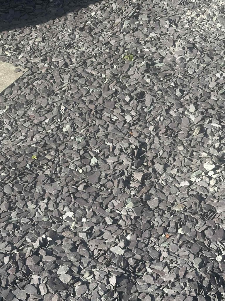 Garden slate. £5 per carrier bag full 