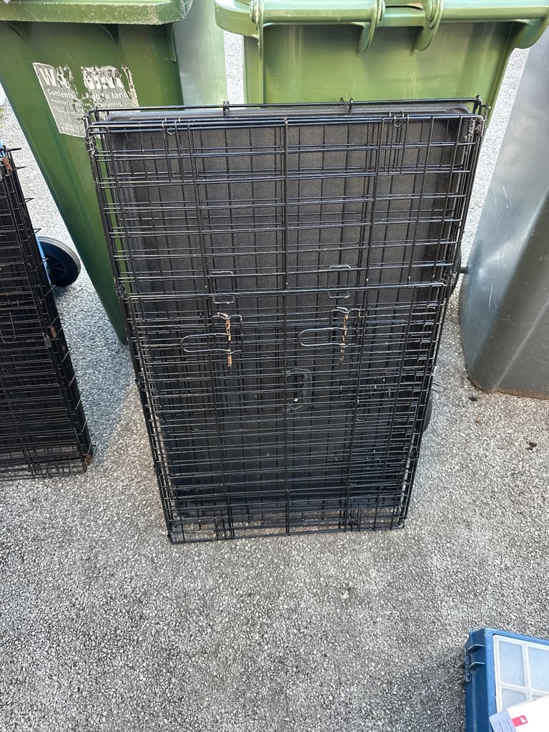 2 dog cages 