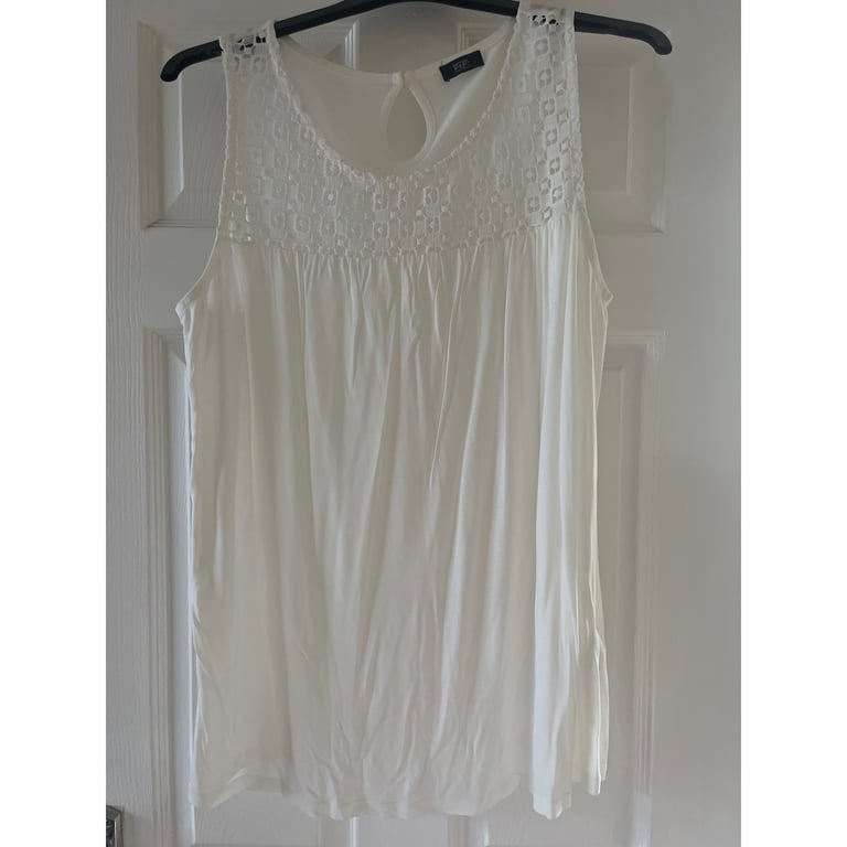 White sleeveless top