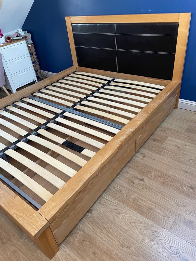 Oak King Size Wooden bed frame with four underbed wheeled drawers 