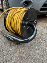 100m water hose on reel. (Great for window cleaners)
