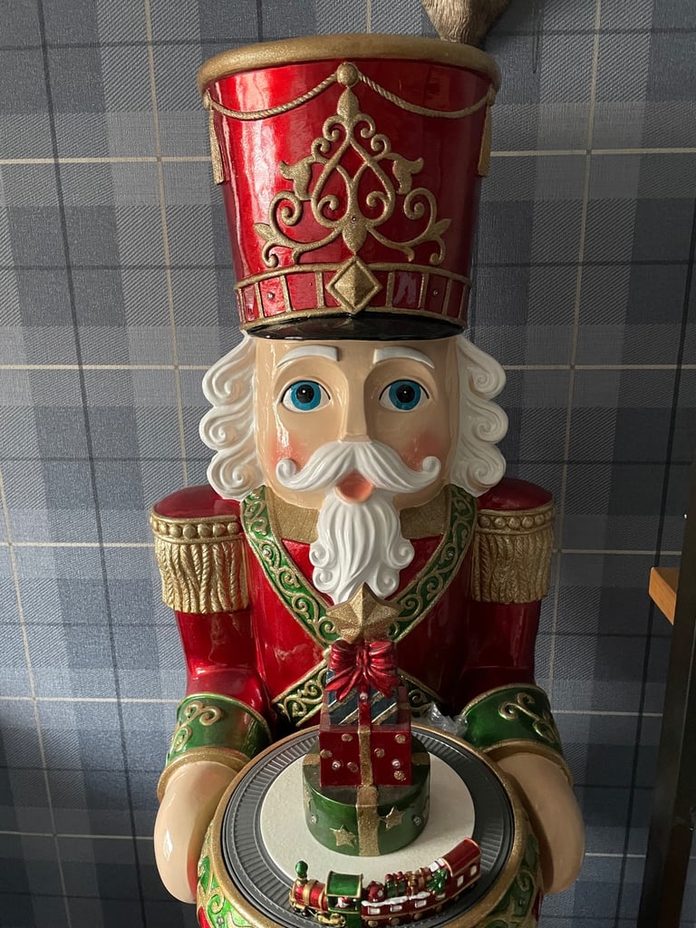 Large Christmas nutcracker 5ft tall lights up and plays music. Like new
