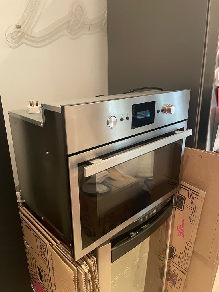 Integrated/Built in IKEA RAFFINERAD MWP R00 fab microwave and oven  