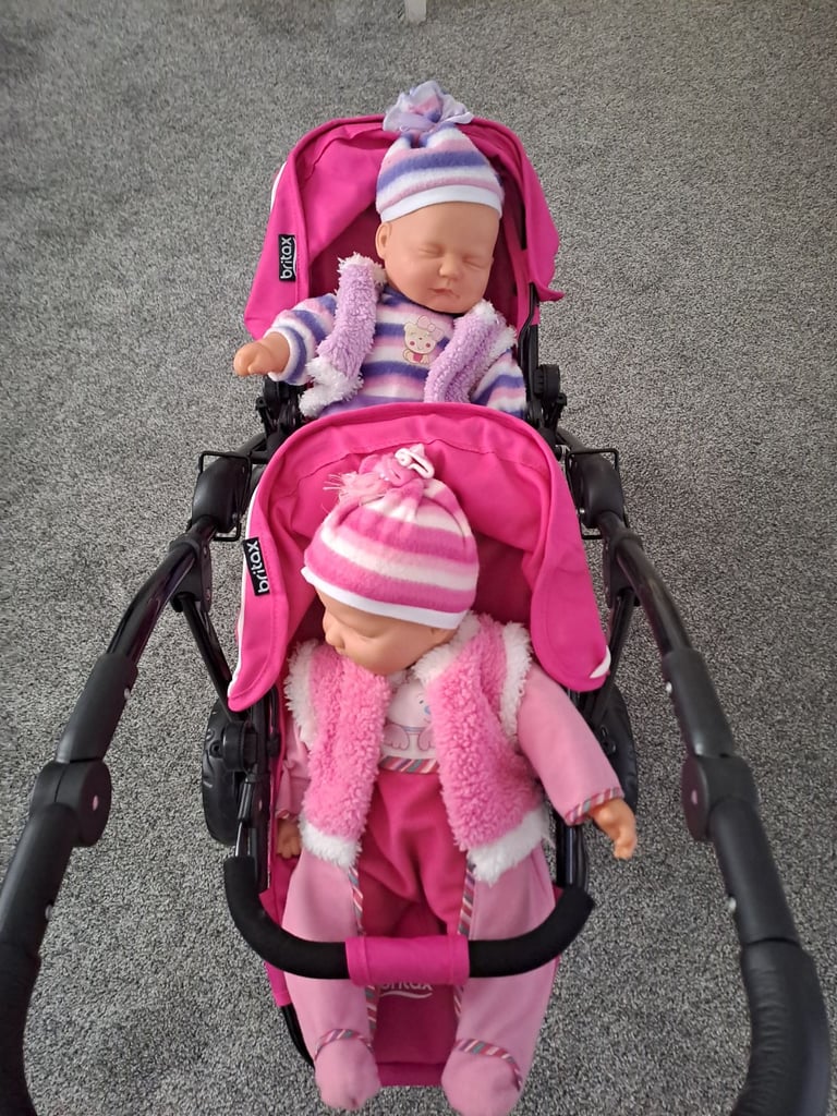 Childrens twin buggies with twin dolls 