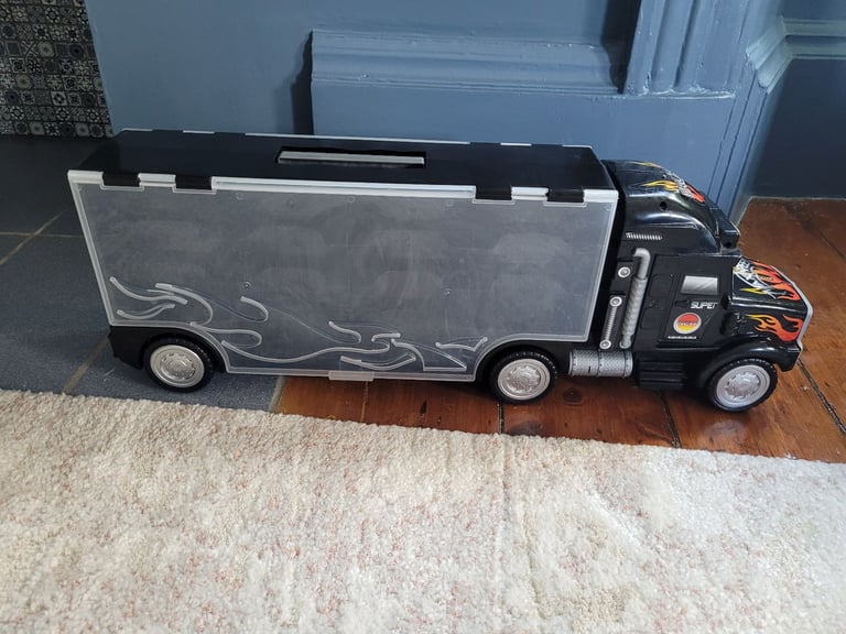 Black car transporter lorry