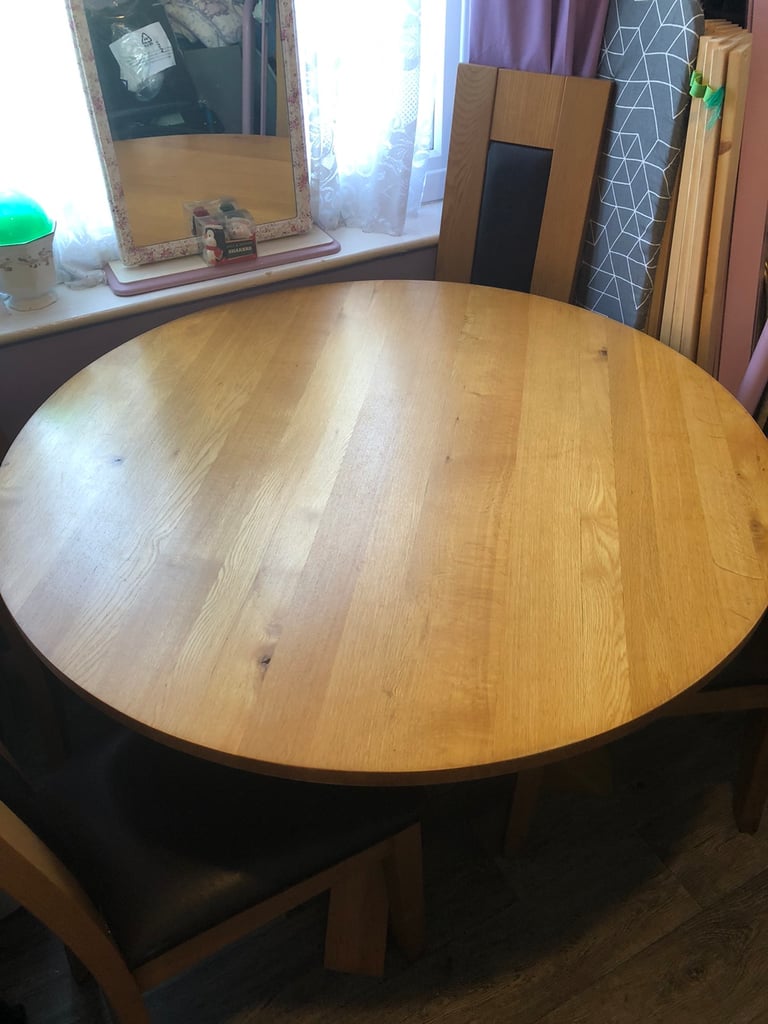Solid oak Dining table and 4 chairs from next OVNO