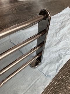 Floating chrome shelf