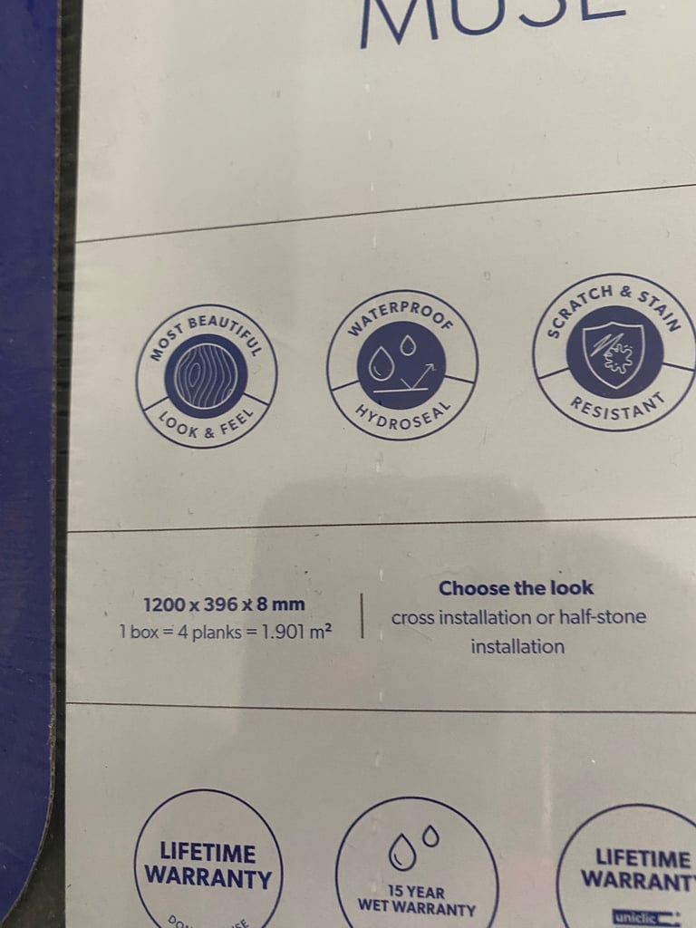 Laminate slate grey tile effect flooring 