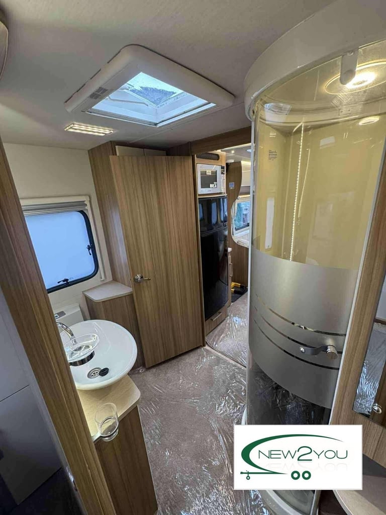 2016 Lunar Delta RI 4 Berth TRASNVERSE BED Caravan - STOCK NO E193