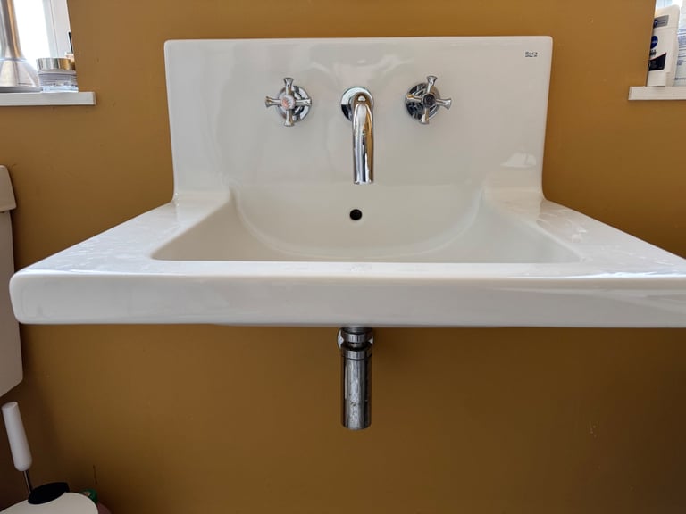 Roca wall mounted sink with back splash